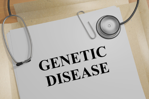 GENETIC DISEASE title mentioned on a medical document kept on a table with a stethoscope near it.