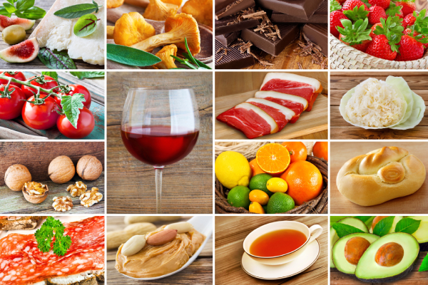 Image of a collage of foods containing histamine arranged on various dishes and bowls kept on wooden table or a brown background.