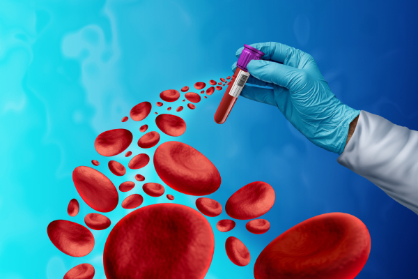 A gloved hand holding a test tube with blood cells floating toward it represents blood testing and screening for early detection of genetic disorders.