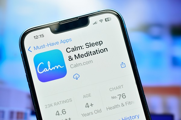 Calm app on iPhone for practicing meditation and sleep, designed to improve sleep quality.