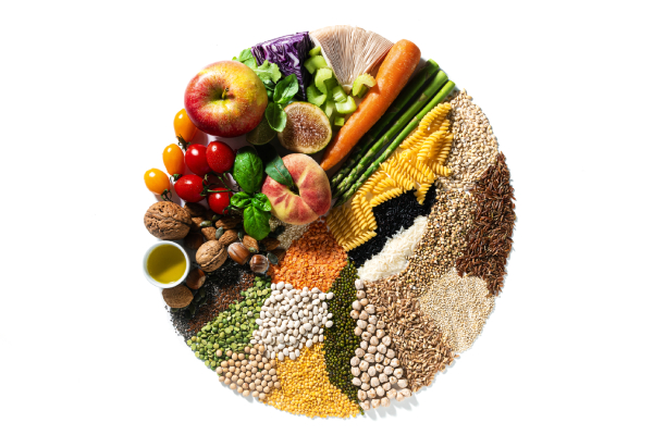 A colorful mix of healthy foods, arranged in a circle, emphasizes the need for proper nutrition in managing diabetes.