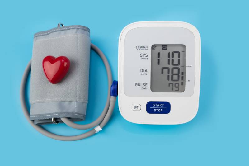 Automatic Digital BP Machine Monitor with readings represent systolic and diastolic values.