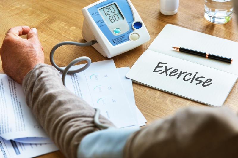 A person checking blood pressure with 